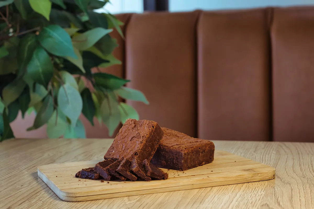Chocolate brownies on a wooden board